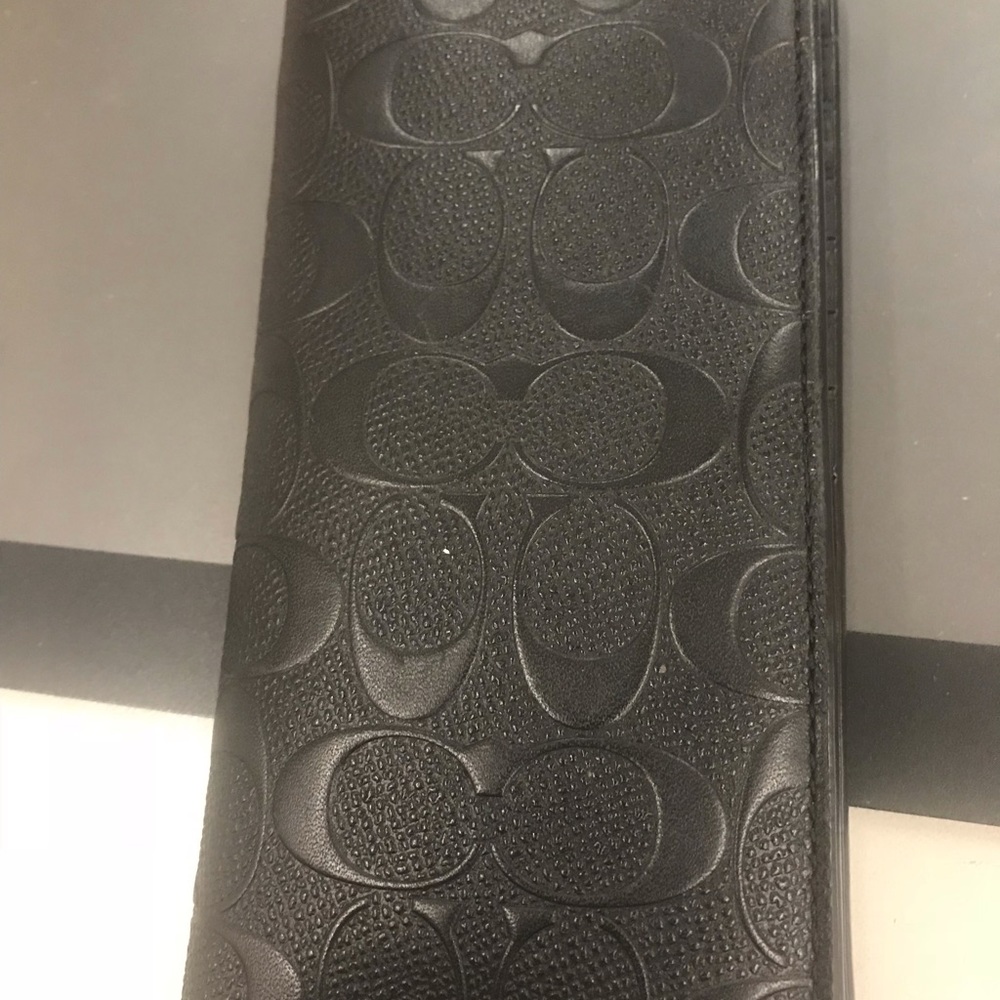 Men’s Coach Wallet.